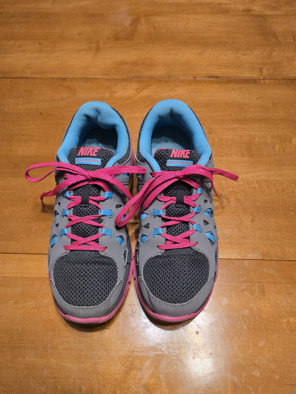 Nike Gray Sneakers with Pink and Teal Accents